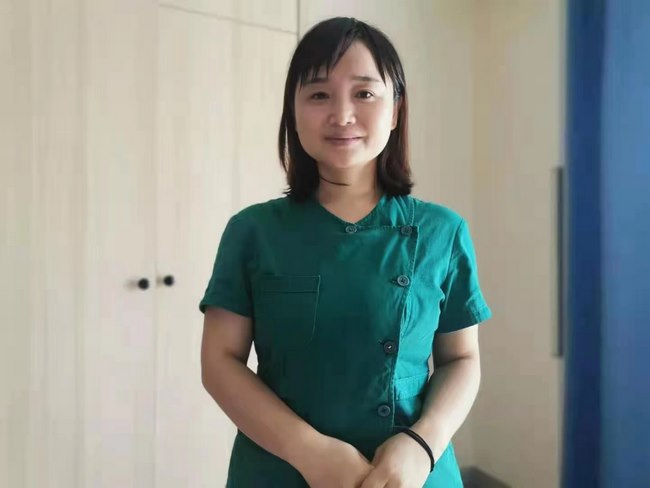 隔離病毒但不隔離愛——記蕪湖市中醫(yī)醫(yī)院隔離點應急醫(yī)療隊隊長楊小榮(圖1)